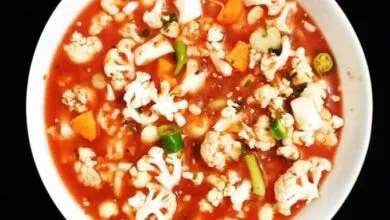 طرز تهیه ترشی گوجه مشهدی؛ ترشی خوشمزه زمستانی با طعمی تند طرز تهیه ترشی گوجه مشهدی؛ ترشی خوشمزه زمستانی با طعمی تند